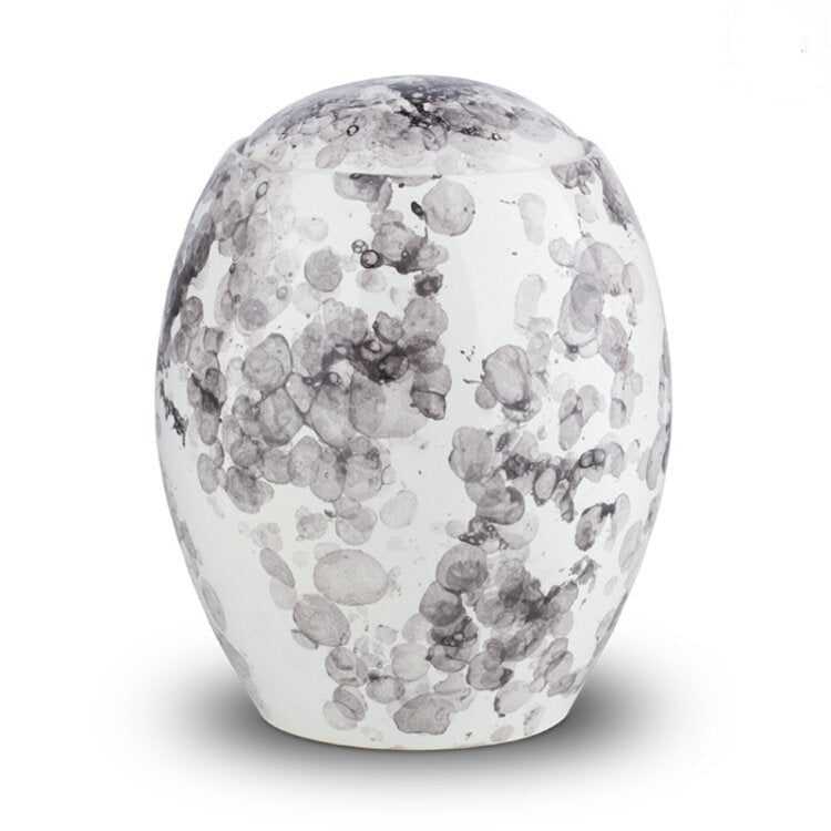 Keramische urn wit-beige met ovale vorm en bubbels patroon